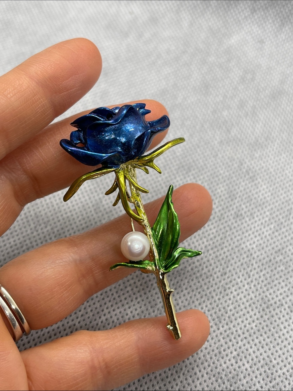 Elegant Gold and Blue Brooch with Pearls